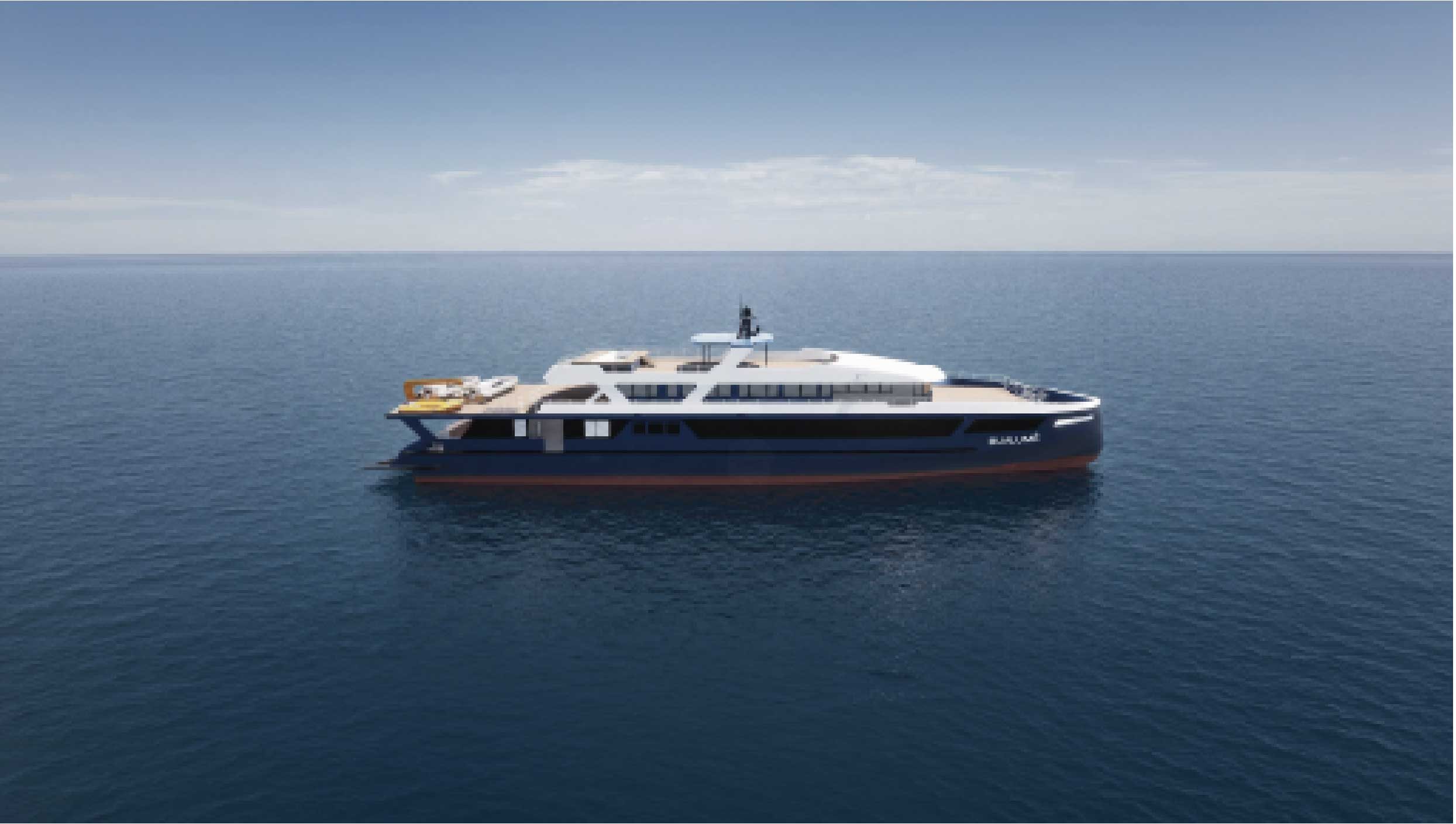 Side view of the Bualume yacht crossing calm open water